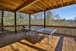 Outdoor screened in ping pong with seating